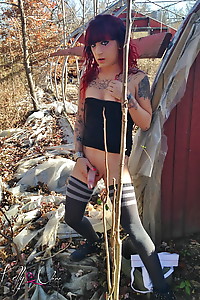 Redhead Kelly naked in backyard