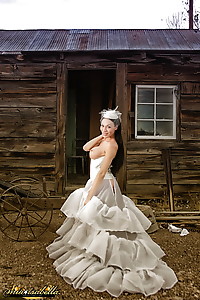 Stunning Mia posing in a gorgeous wedding dress