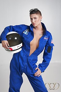 TS Danni posing in astronaut suit