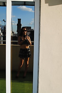 Latin Nicole on rooftop