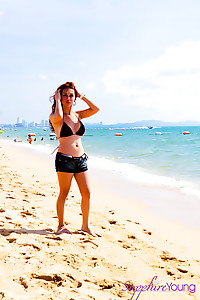 What a Feminine Shemale showing off her curves at the beach in Thailand