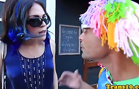 Tranny giving head to clown with big dick