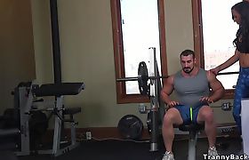 Tranny fitness instructor fucks muscled guy