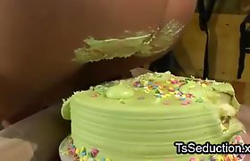 Bdsm guy licks cake from ass of tranny and gets handjob